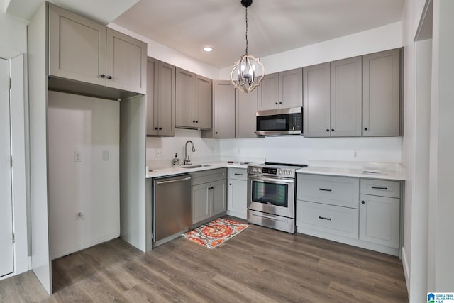 442 Lakeview Cir, Alpine, AL 35014 - kitchen featuring appliances with stainless steel finishes, gray cabinetry, a chandelier, recessed lighting, and dark wood finished floors