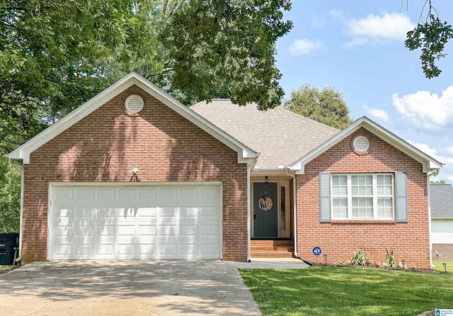 489 Bailey Loop Rd, Gardendale, AL 35071 - view of front of home with a garage, driveway, brick siding, a front lawn, and entry steps