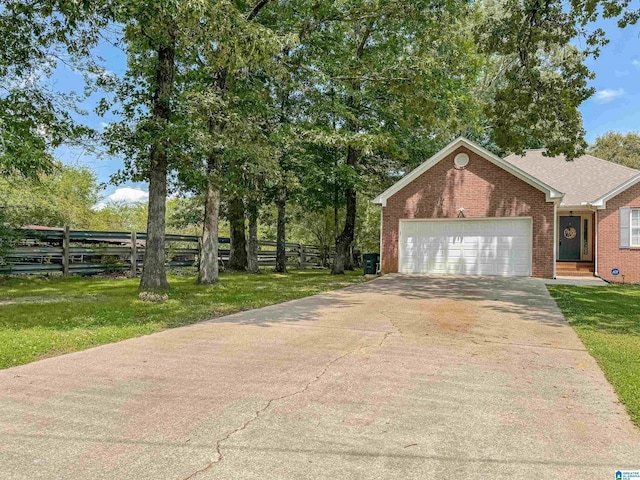 489 Bailey Loop Rd, Gardendale, AL 35071 - view of front of home with a garage, driveway, and brick siding
