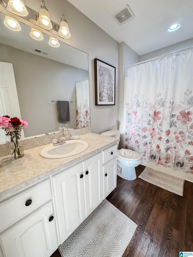 489 Bailey Loop Rd, Gardendale, AL 35071 - full bathroom featuring vanity, wood finished floors, a shower with curtain, and recessed lighting