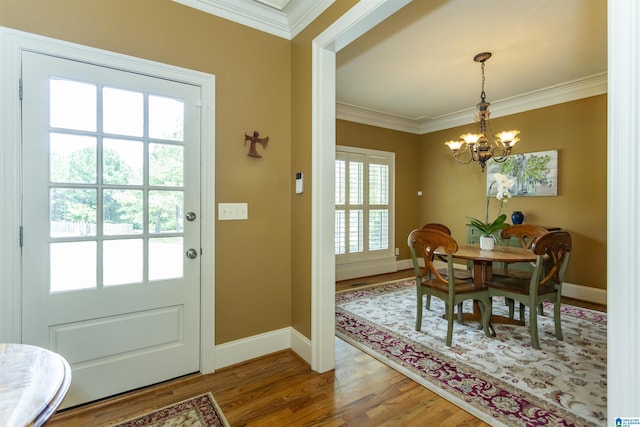 5668 Carrington Lake Pkwy, Trussville, AL 35173 - dining room featuring a chandelier, ornamental molding, and wood finished floors