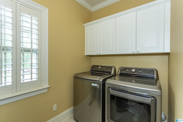 5668 Carrington Lake Pkwy, Trussville, AL 35173 - laundry room featuring washer and dryer, cabinet space, and crown molding