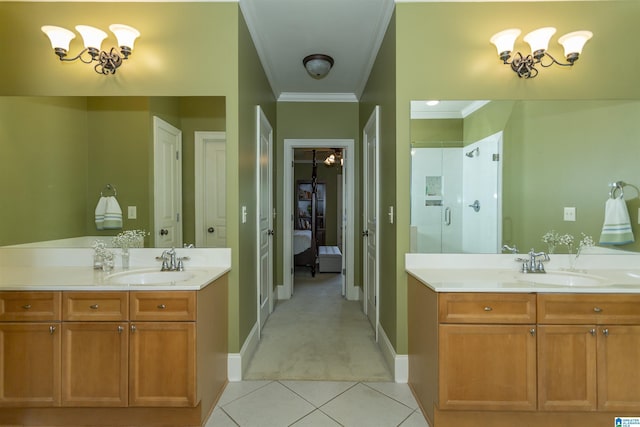 5668 Carrington Lake Pkwy, Trussville, AL 35173 - full bath with ornamental molding, connected bathroom, tile patterned floors, two vanities, and a shower stall