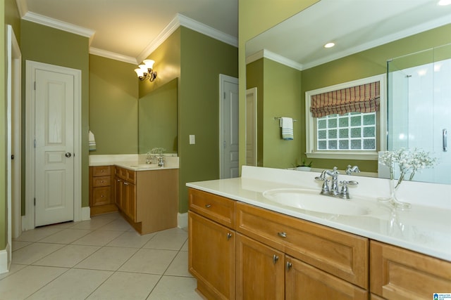5668 Carrington Lake Pkwy, Trussville, AL 35173 - bathroom with two vanities, ornamental molding, and tile patterned flooring