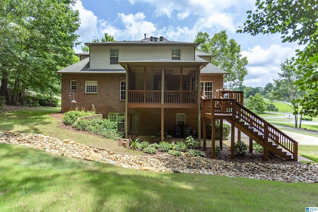 5668 Carrington Lake Pkwy, Trussville, AL 35173 - back of house featuring brick siding, stairs, a sunroom, a lawn, and a patio