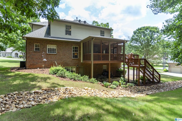 5668 Carrington Lake Pkwy, Trussville, AL 35173 - back of property featuring a sunroom, brick siding, a lawn, stairway, and a patio area