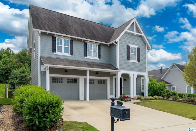 7593 Paine Dr, Trussville, AL 35173 - traditional-style house featuring concrete driveway, roof with shingles, an attached garage, a front yard, and a porch
