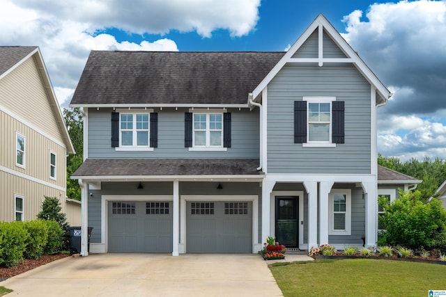 7593 Paine Dr, Trussville, AL 35173 - view of front of property featuring roof with shingles, concrete driveway, and a garage