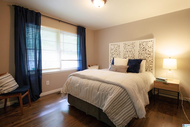 4648 Clairmont Ave S, Birmingham, AL 35222 - bedroom with baseboards and wood finished floors