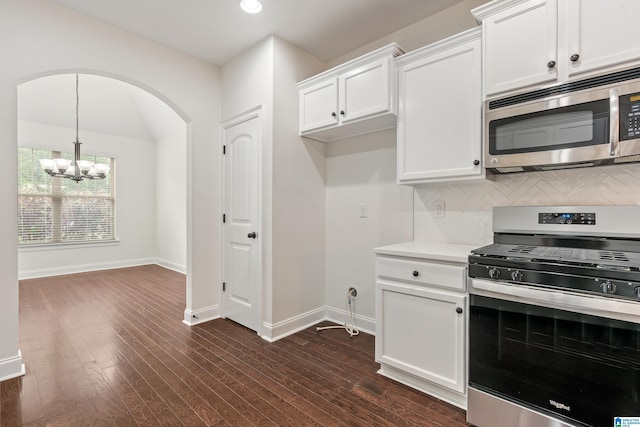 5381 Park Side Cir, Hoover, AL 35244 - kitchen featuring stainless steel appliances, a chandelier, backsplash, white cabinetry, and light countertops