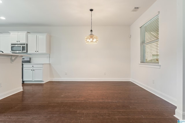 5381 Park Side Cir, Hoover, AL 35244 - unfurnished dining area featuring dark wood-type flooring, a chandelier, and recessed lighting