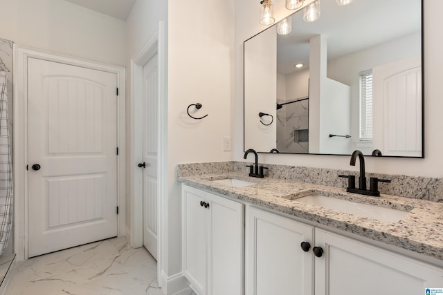 5381 Park Side Cir, Hoover, AL 35244 - bathroom featuring marble finish floors, double vanity, and a shower