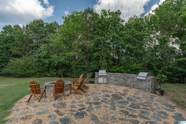 5381 Park Side Cir, Hoover, AL 35244 - view of patio featuring exterior kitchen and an outdoor fire pit