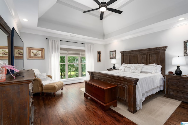 715 W Cassie Dr, Pell City, AL 35128 - bedroom featuring dark wood-style floors, recessed lighting, ornamental molding, a raised ceiling, and a ceiling fan