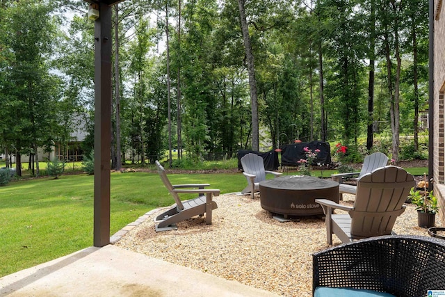715 W Cassie Dr, Pell City, AL 35128 - view of patio / terrace featuring an outdoor fire pit