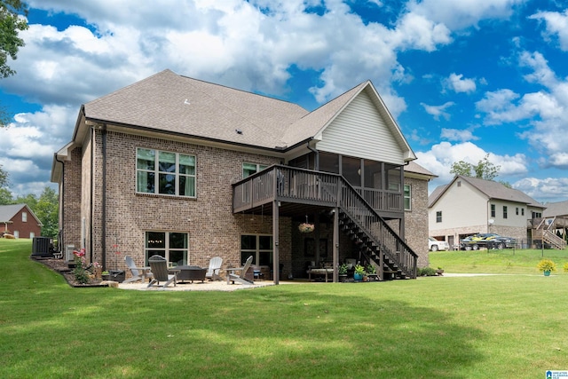 715 W Cassie Dr, Pell City, AL 35128 - rear view of house with a sunroom, stairway, brick siding, and a patio area