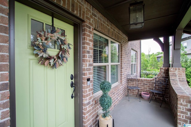 5250 Kate Cv, Trussville, AL 35173 - property entrance with a porch and brick siding
