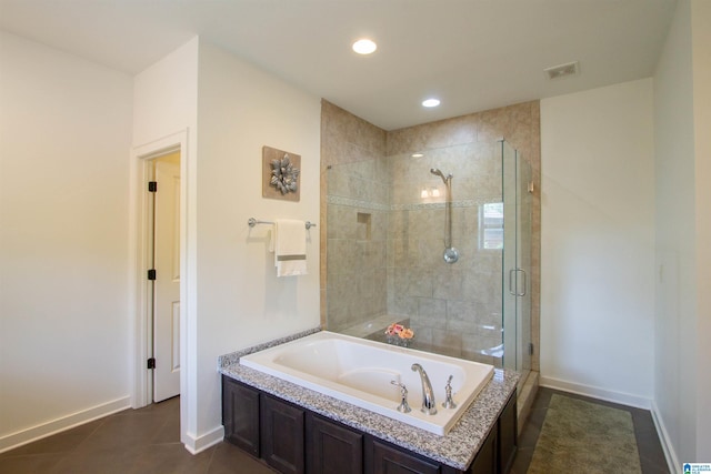 5250 Kate Cv, Trussville, AL 35173 - bathroom featuring a bath, a shower stall, recessed lighting, and tile patterned floors