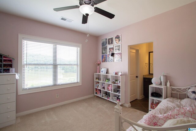 5250 Kate Cv, Trussville, AL 35173 - carpeted bedroom featuring multiple windows and a ceiling fan