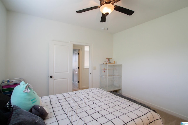 5250 Kate Cv, Trussville, AL 35173 - carpeted bedroom featuring baseboards and ceiling fan