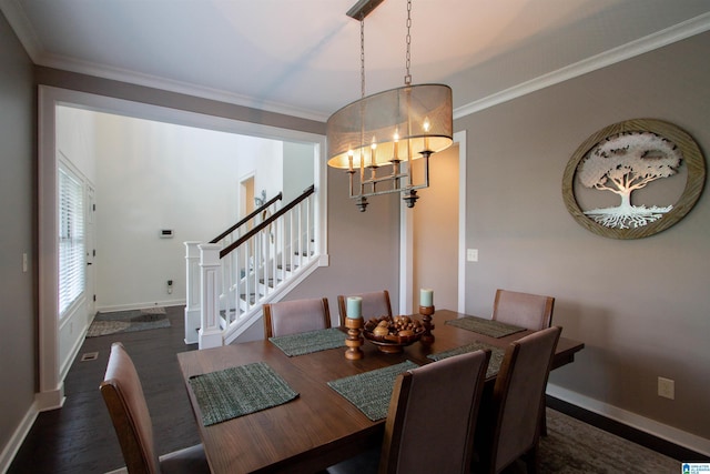 5250 Kate Cv, Trussville, AL 35173 - dining room with a chandelier, stairway, wood finished floors, and crown molding