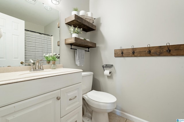 405 Willow Dr, Hueytown, AL 35023 - bathroom with vanity and tile patterned floors