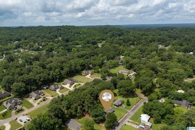 405 Willow Dr, Hueytown, AL 35023 - aerial view of property and surrounding area with a heavily wooded area