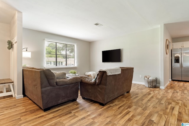 405 Willow Dr, Hueytown, AL 35023 - living area with light wood finished floors and baseboards