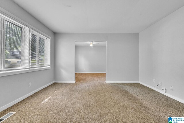 1341 Hatfield Ln, Birmingham, AL 35215 - carpeted spare room with ceiling fan and baseboards