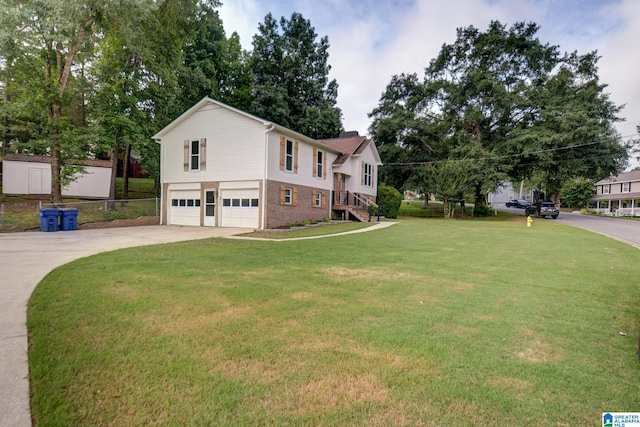204 Shalimar Cir, Alabaster, AL 35007 - view of front facade with an attached garage, concrete driveway, a front yard, and brick siding