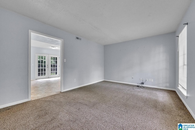 1722 6th Place Cir NW, Center Point, AL 35215 - spare room featuring carpet and french doors