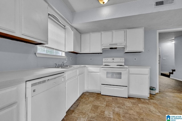 1722 6th Place Cir NW, Center Point, AL 35215 - kitchen with white appliances, under cabinet range hood, white cabinetry, light countertops, and stone finish flooring