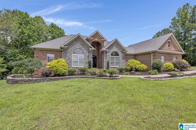 8664 County Line Rd, Dora, AL 35062 - view of front facade with a front yard, brick siding, stone siding, and a shingled roof