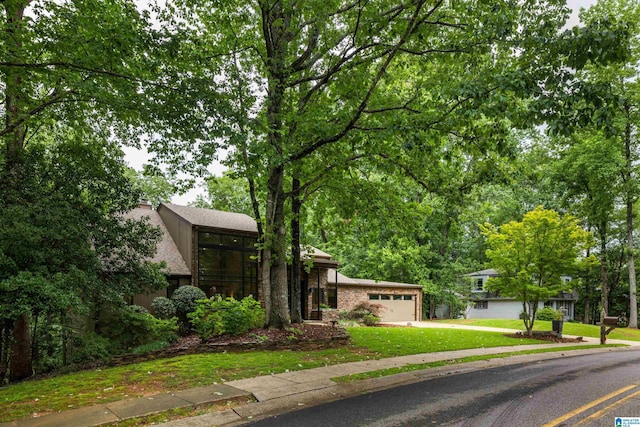 3709 Dover Dr, Mountain Brook, AL 35223 - view of front of property featuring a garage, driveway, and a front yard