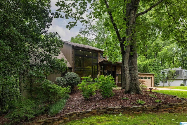 3709 Dover Dr, Mountain Brook, AL 35223 - rear view of house featuring a garage