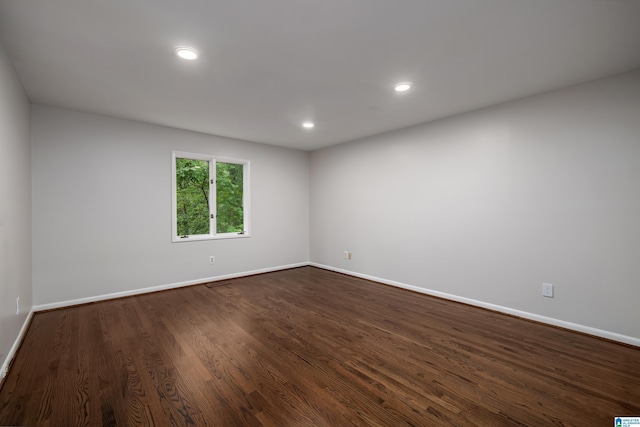 3709 Dover Dr, Mountain Brook, AL 35223 - spare room featuring dark wood-style flooring and recessed lighting