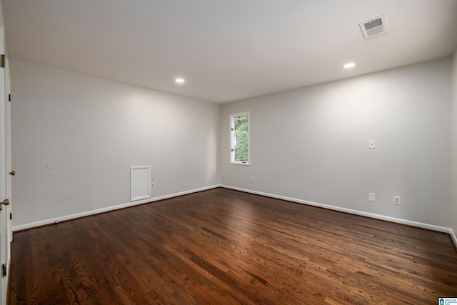 3709 Dover Dr, Mountain Brook, AL 35223 - empty room with dark wood finished floors and recessed lighting