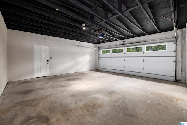 3709 Dover Dr, Mountain Brook, AL 35223 - garage featuring a garage door opener