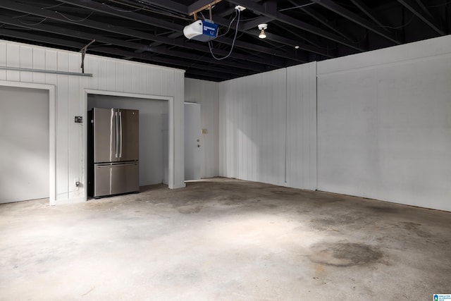 3709 Dover Dr, Mountain Brook, AL 35223 - garage with freestanding refrigerator and a garage door opener