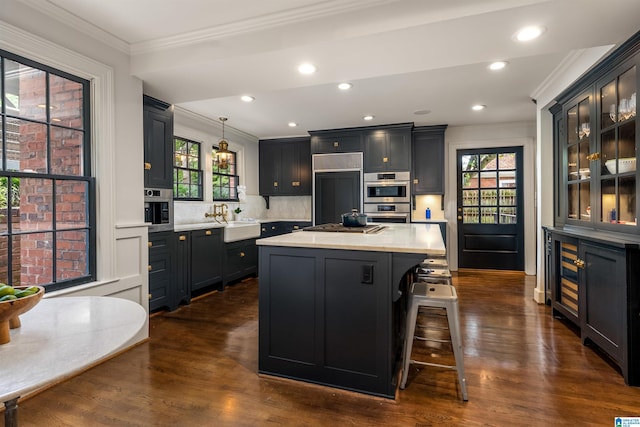 3443 Cliff Rd S, Birmingham, AL 35205 - kitchen featuring crown molding, paneled built in refrigerator, wine cooler, dark wood-type flooring, and tasteful backsplash