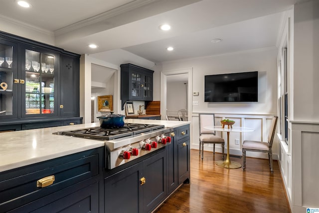 3443 Cliff Rd S, Birmingham, AL 35205 - kitchen with stainless steel gas stovetop, ornamental molding, recessed lighting, glass insert cabinets, and dark wood finished floors