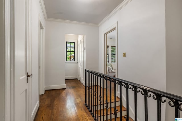 3443 Cliff Rd S, Birmingham, AL 35205 - hall featuring dark wood-type flooring, crown molding, and an upstairs landing