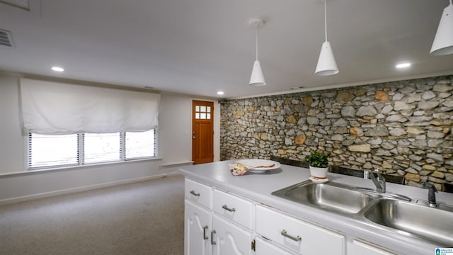 3443 Cliff Rd S, Birmingham, AL 35205 - kitchen featuring white cabinetry, carpet, light countertops, pendant lighting, and recessed lighting