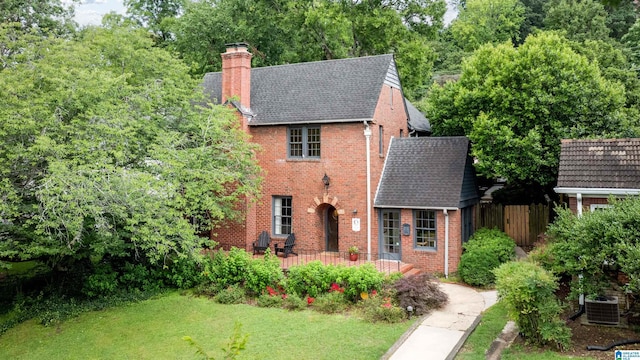 3443 Cliff Rd S, Birmingham, AL 35205 - tudor-style house with brick siding and a chimney
