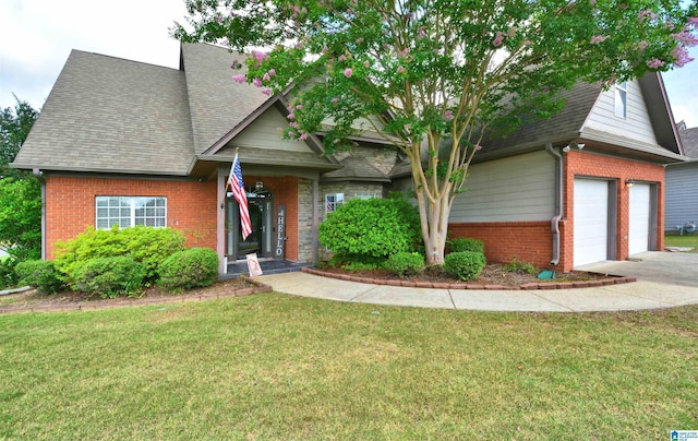 401 Waterford Highlands Way, Calera, AL 35040 - view of front facade with brick siding, a front lawn, a shingled roof, and driveway