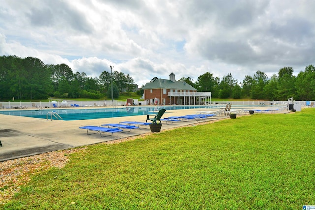 401 Waterford Highlands Way, Calera, AL 35040 - community pool with a patio and view of wooded area