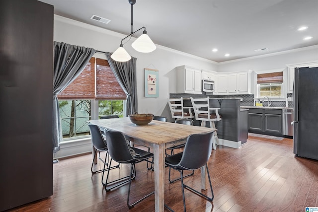 1221 Grants Way, Irondale, AL 35210 - dining room featuring crown molding, wood-type flooring, and recessed lighting
