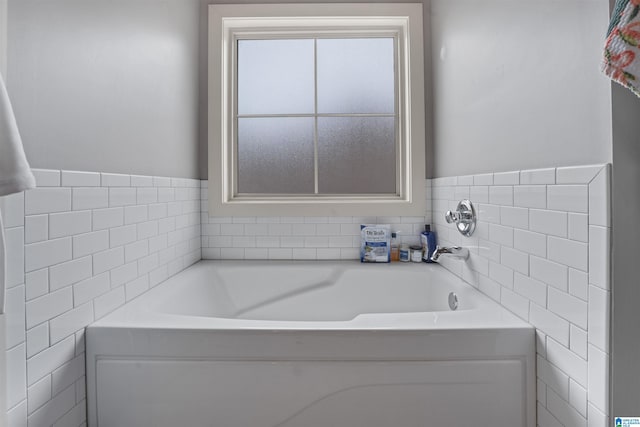 1221 Grants Way, Irondale, AL 35210 - bathroom featuring a garden tub and tile walls
