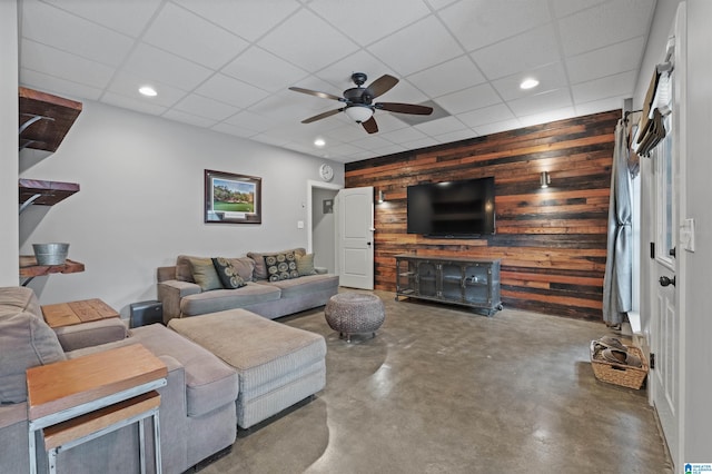 1221 Grants Way, Irondale, AL 35210 - living room with wooden walls, ceiling fan, concrete floors, recessed lighting, and a drop ceiling