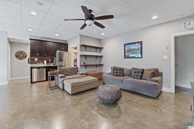 1221 Grants Way, Irondale, AL 35210 - living area with finished concrete flooring, a ceiling fan, a drop ceiling, wet bar, and recessed lighting